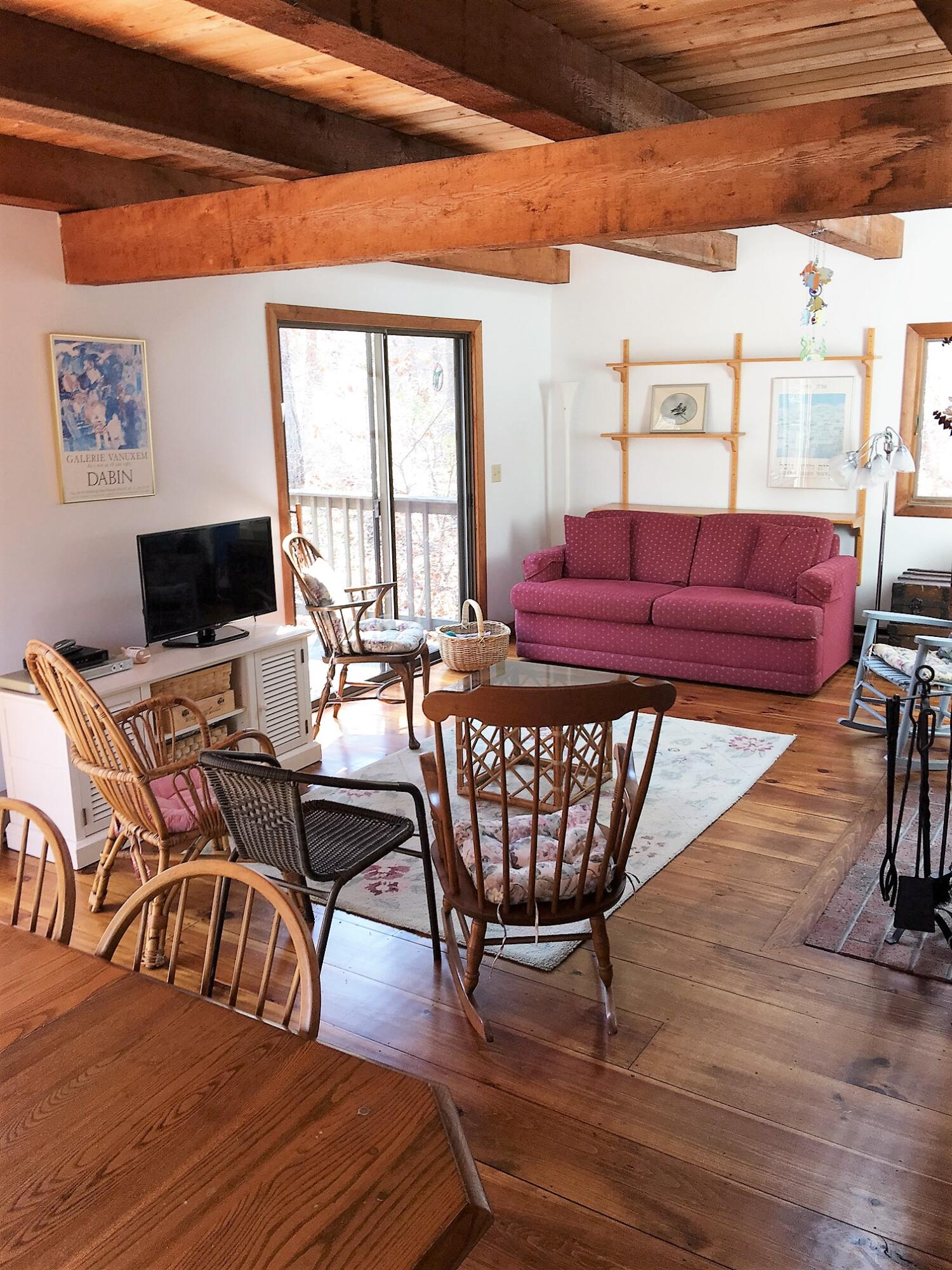 10 Pine Valley Road Wellfleet, MA 02667 - Photo 6 of 27 a view of a dining room with furniture window and outside view