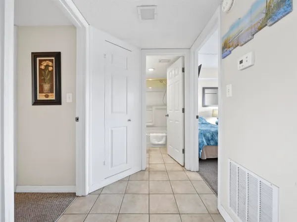 a bathroom with a shower and a sink