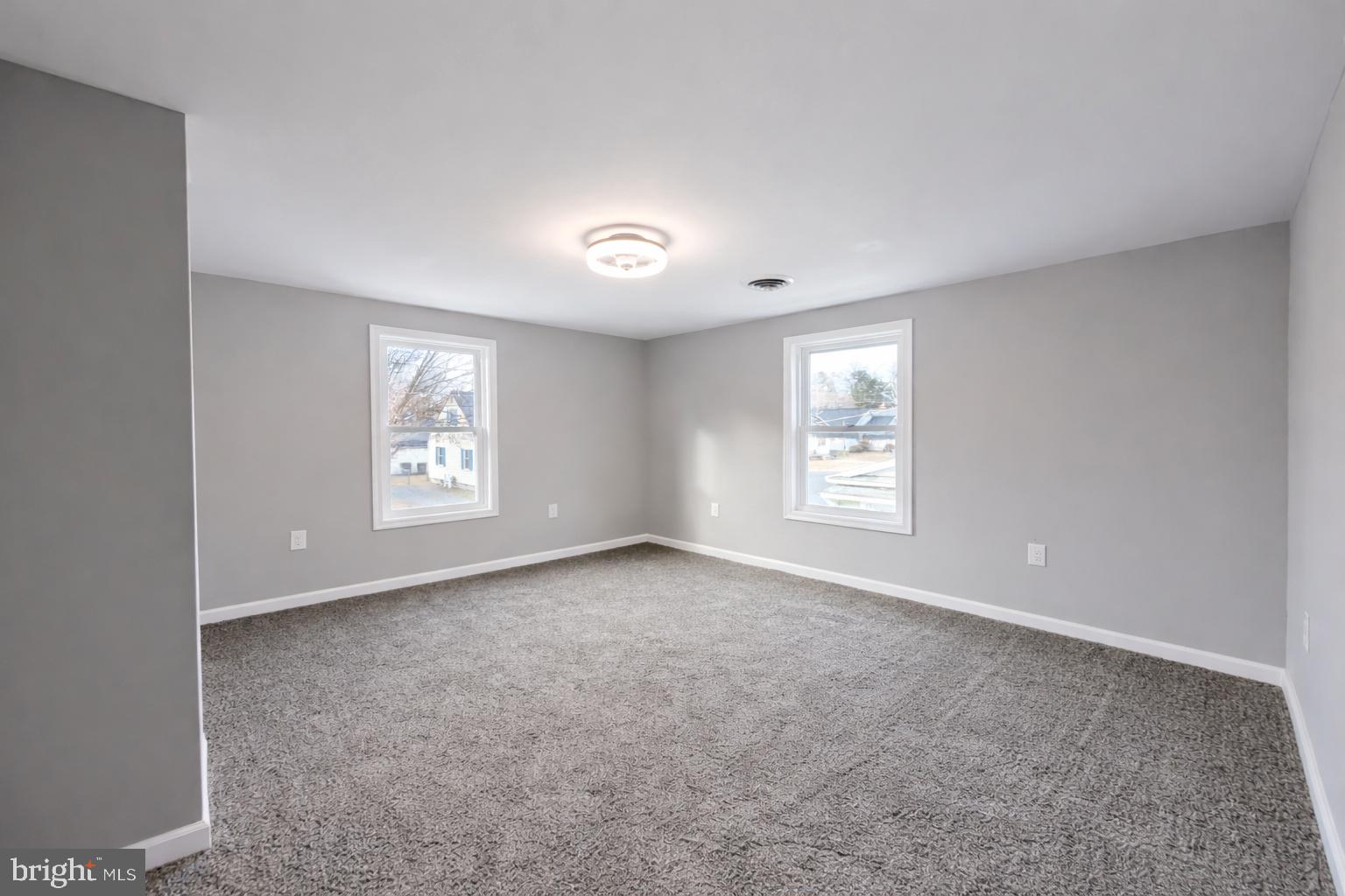 703 Madison Street Salisbury, MD 21804 - Photo 15 of 22 an empty room with windows