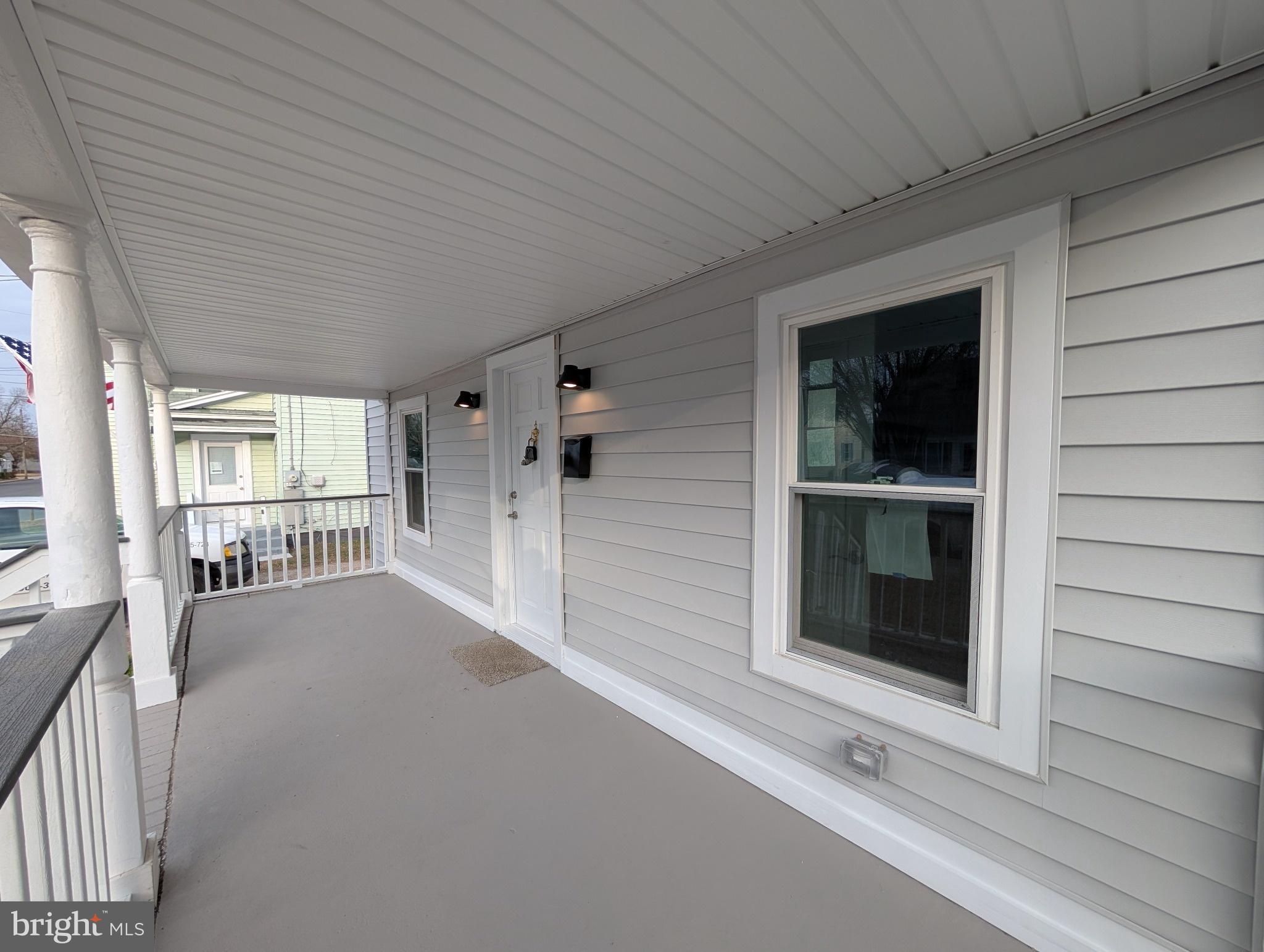 703 Madison Street Salisbury, MD 21804 - Photo 4 of 22 a view of an entryway with a livingroom