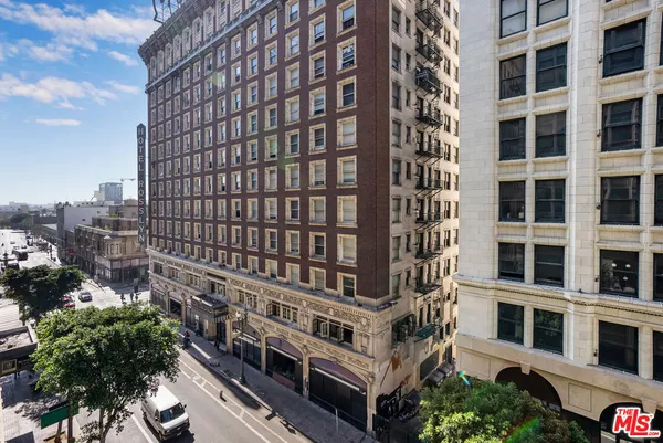 a view of a building with a street