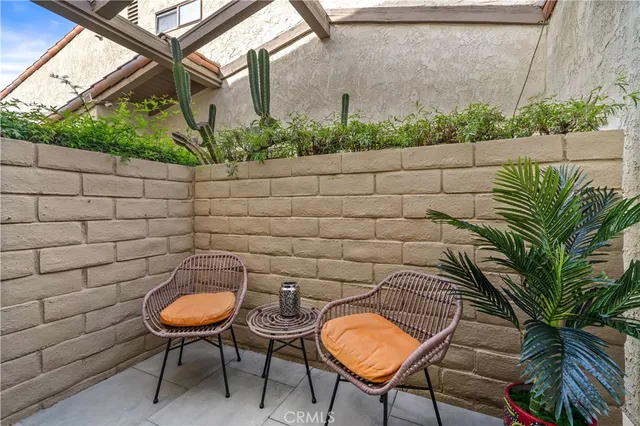 a kitchen with stainless steel appliances a stove microwave and sink