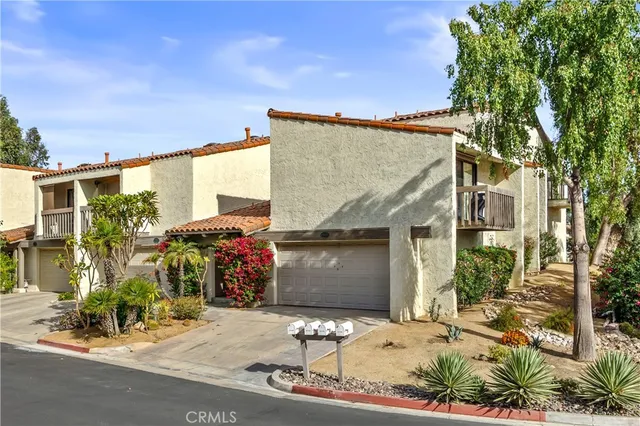 front view of a house with a street