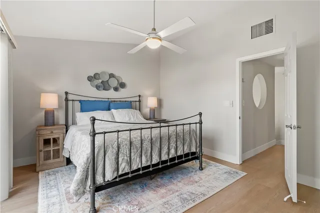 a bathroom with a shower a toilet and a sink