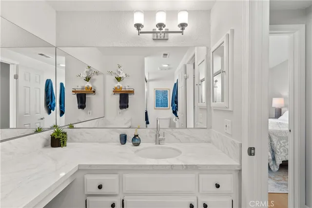 an aerial view of residential houses and outdoor space