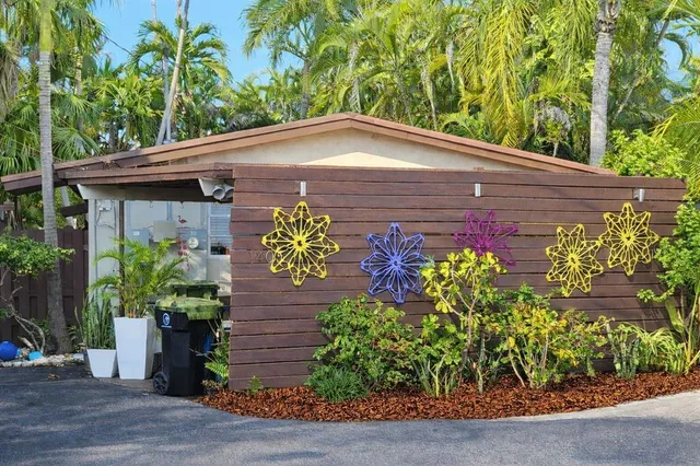 a view of a garden with a wooden bench