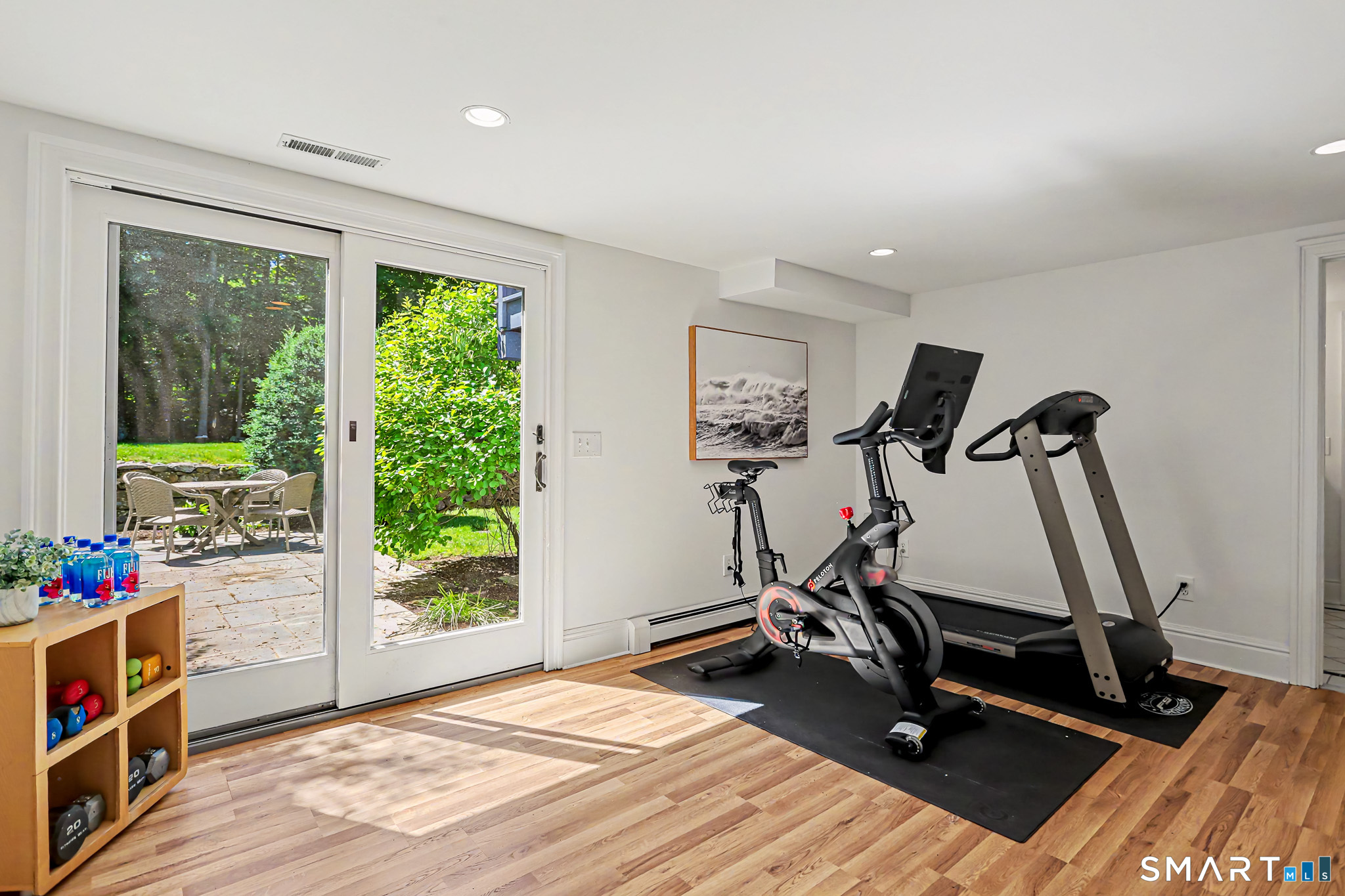 6 Adams Way Weston, CT 06883 - Photo 30 of 40 The gym has a slider to the patio.