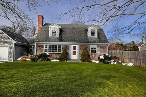 a view of a house with a big yard