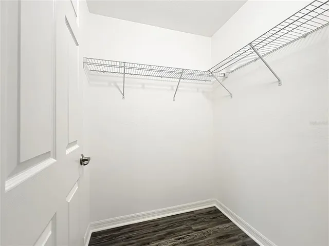 a view of a room with racks on the wall