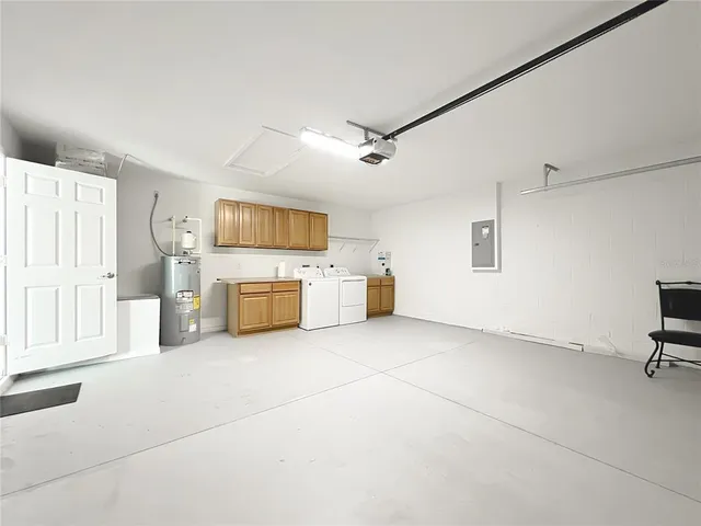 a view of a livingroom with furniture and flat screen tv