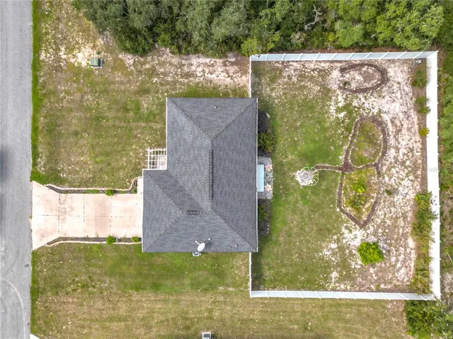 a view of bath tub sitting next to a yard