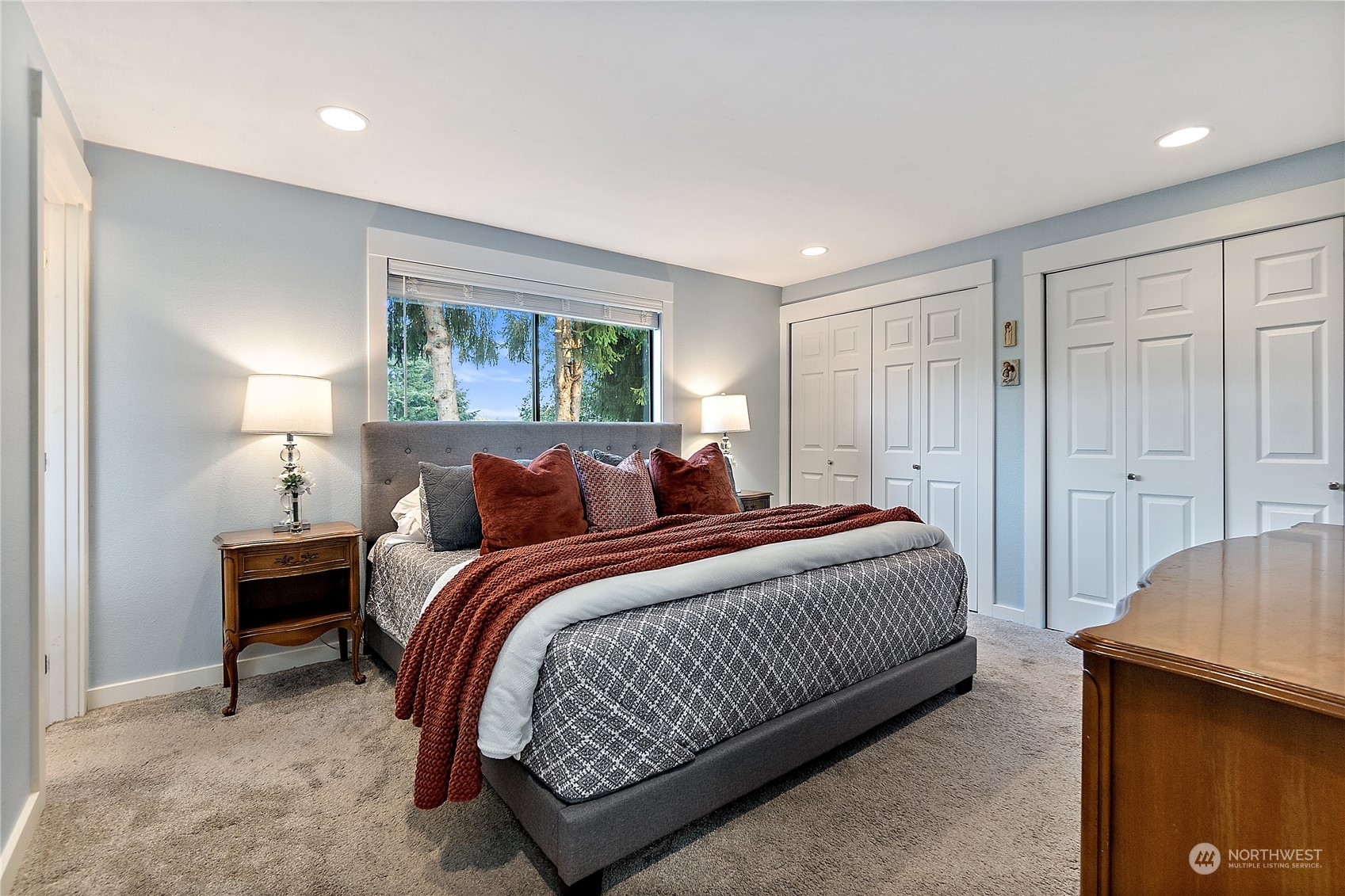 18434 129th Lane Northeast Bothell, WA 98011 - Photo 12 of 33 a bed room with a bed and a window