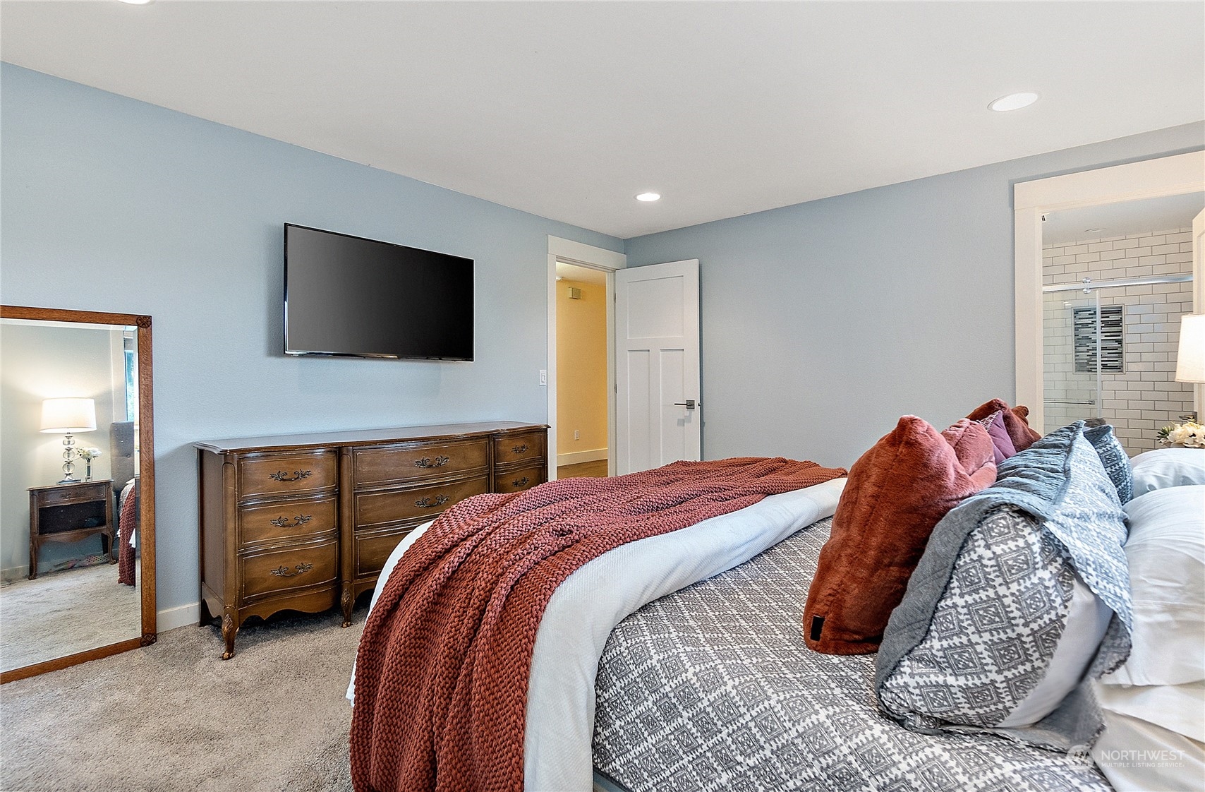 18434 129th Lane Northeast Bothell, WA 98011 - Photo 13 of 33 a bedroom with a bed and a television