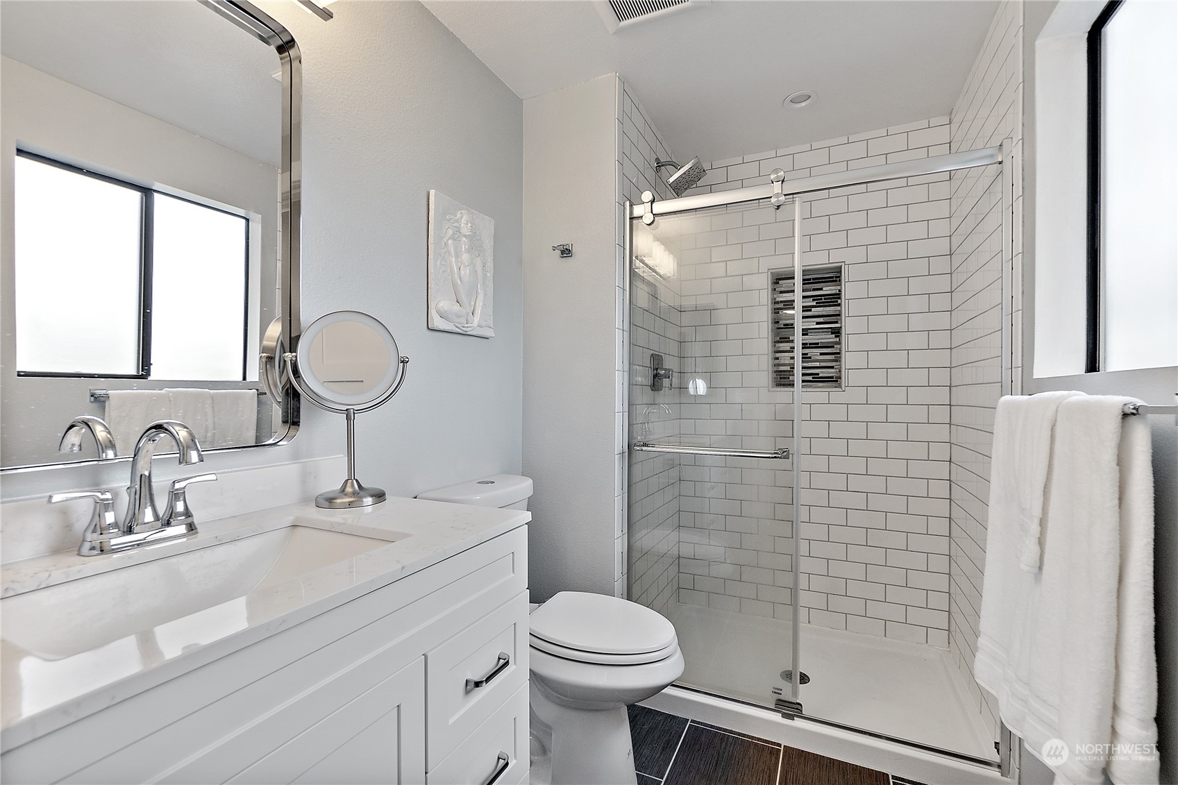 18434 129th Lane Northeast Bothell, WA 98011 - Photo 14 of 33 a bathroom with a sink toilet and shower