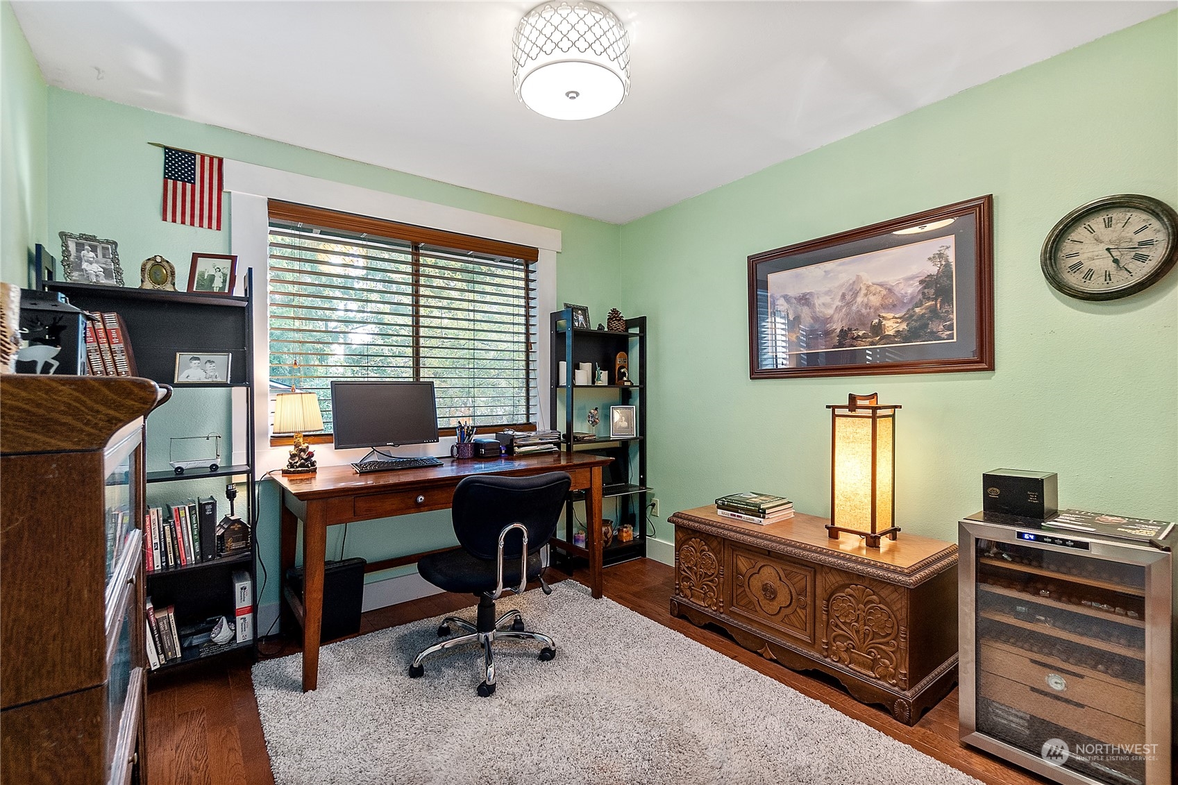 18434 129th Lane Northeast Bothell, WA 98011 - Photo 19 of 33 a view of a workspace with furniture and a window