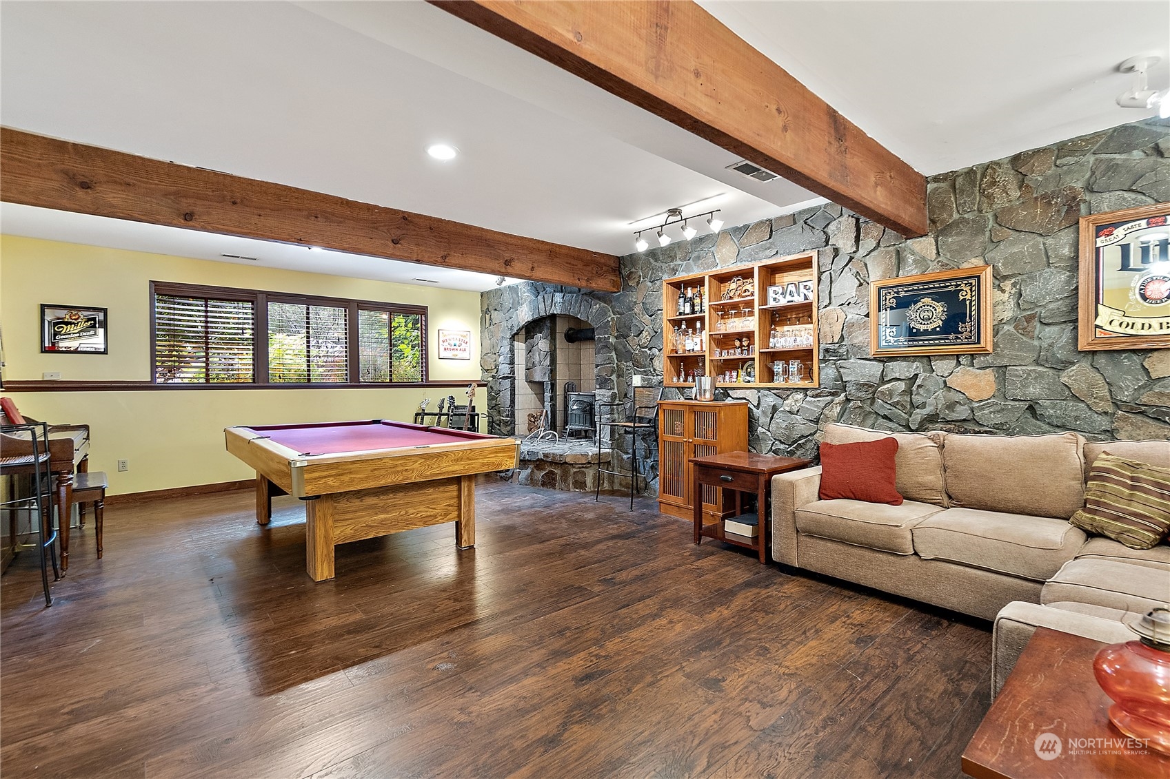 18434 129th Lane Northeast Bothell, WA 98011 - Photo 22 of 33 a living room with furniture and a wooden floor