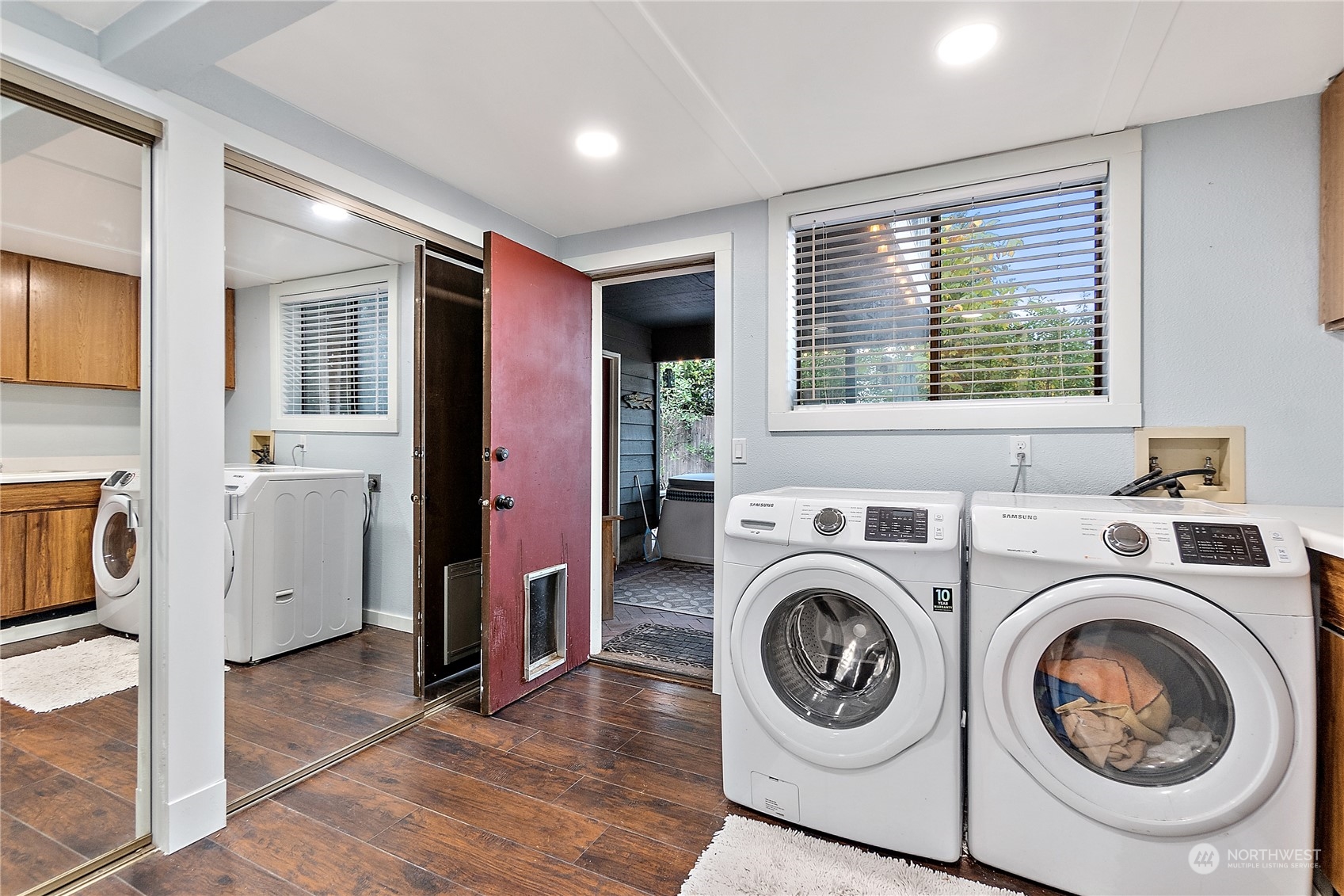 18434 129th Lane Northeast Bothell, WA 98011 - Photo 23 of 33 a view of a storage & utility room with washer and dryer