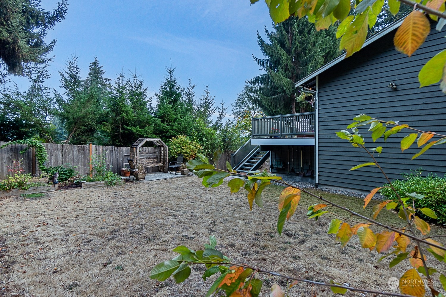 18434 129th Lane Northeast Bothell, WA 98011 - Photo 29 of 33 a view of a house with backyard and sitting area