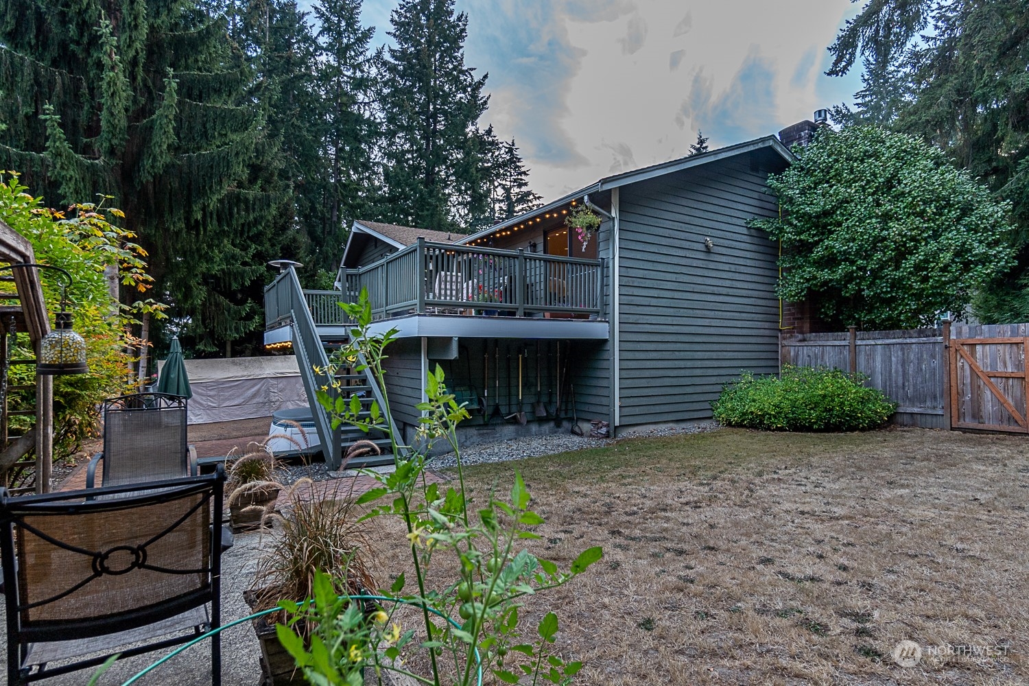 18434 129th Lane Northeast Bothell, WA 98011 - Photo 30 of 33 a front view of a house with garden