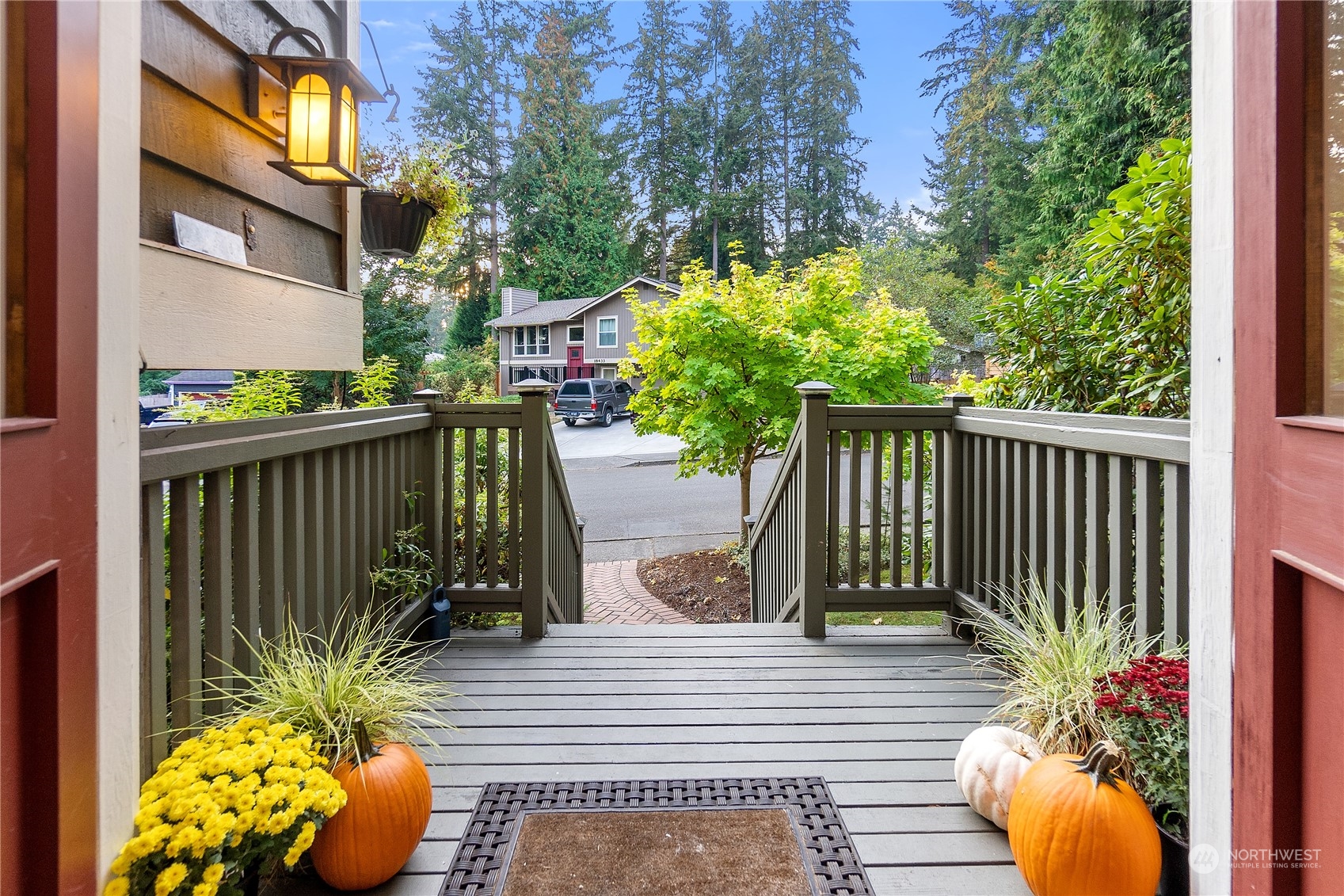 18434 129th Lane Northeast Bothell, WA 98011 - Photo 3 of 33 a view of a balcony with potted plants