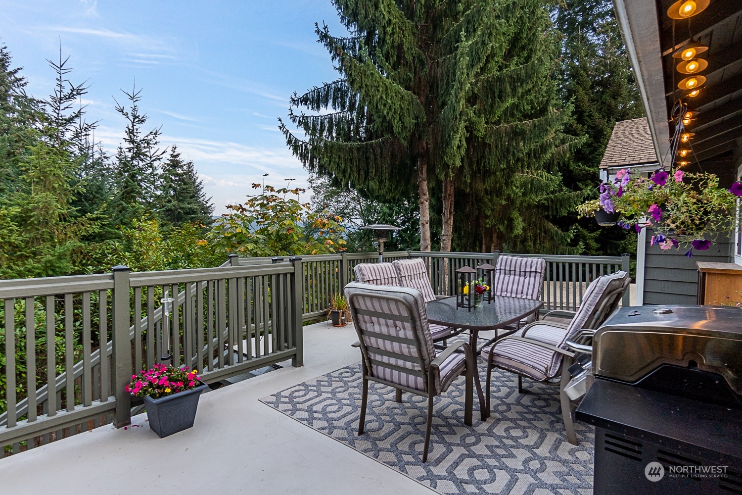 18434 129th Lane Northeast Bothell, WA 98011 - Photo 10 of 33 a view of a chairs and table in the roof