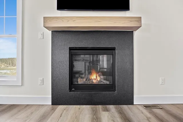 a close view of a fireplace in a room