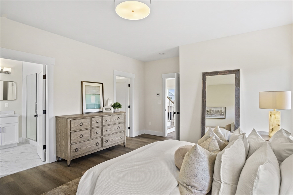 25 Salisbury Hill Boulevard, Unit 67 Worcester, MA 01609 - Photo 16 of 42 a bedroom with a bed and a dresser