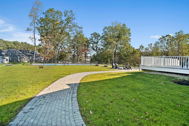 a view of a swimming pool with a garden