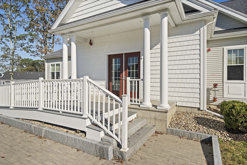25 Salisbury Hill Boulevard, Unit 67 Worcester, MA 01609 - Photo 42 of 42 a view of a house with wooden fence