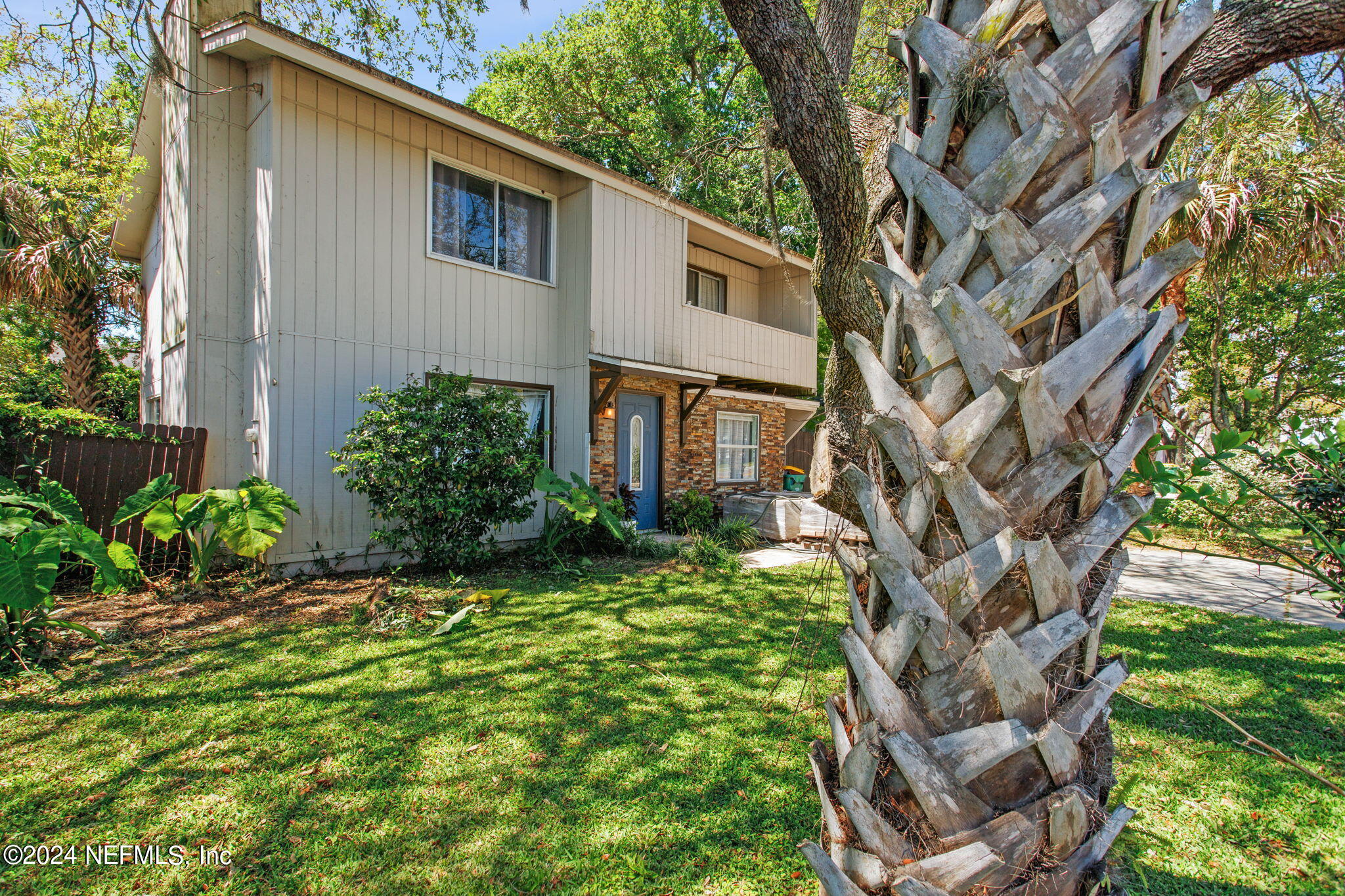 1154 Penman Road Jacksonville Beach, FL 32250 - Photo 1 of 20 a backyard of a house with lots of green space