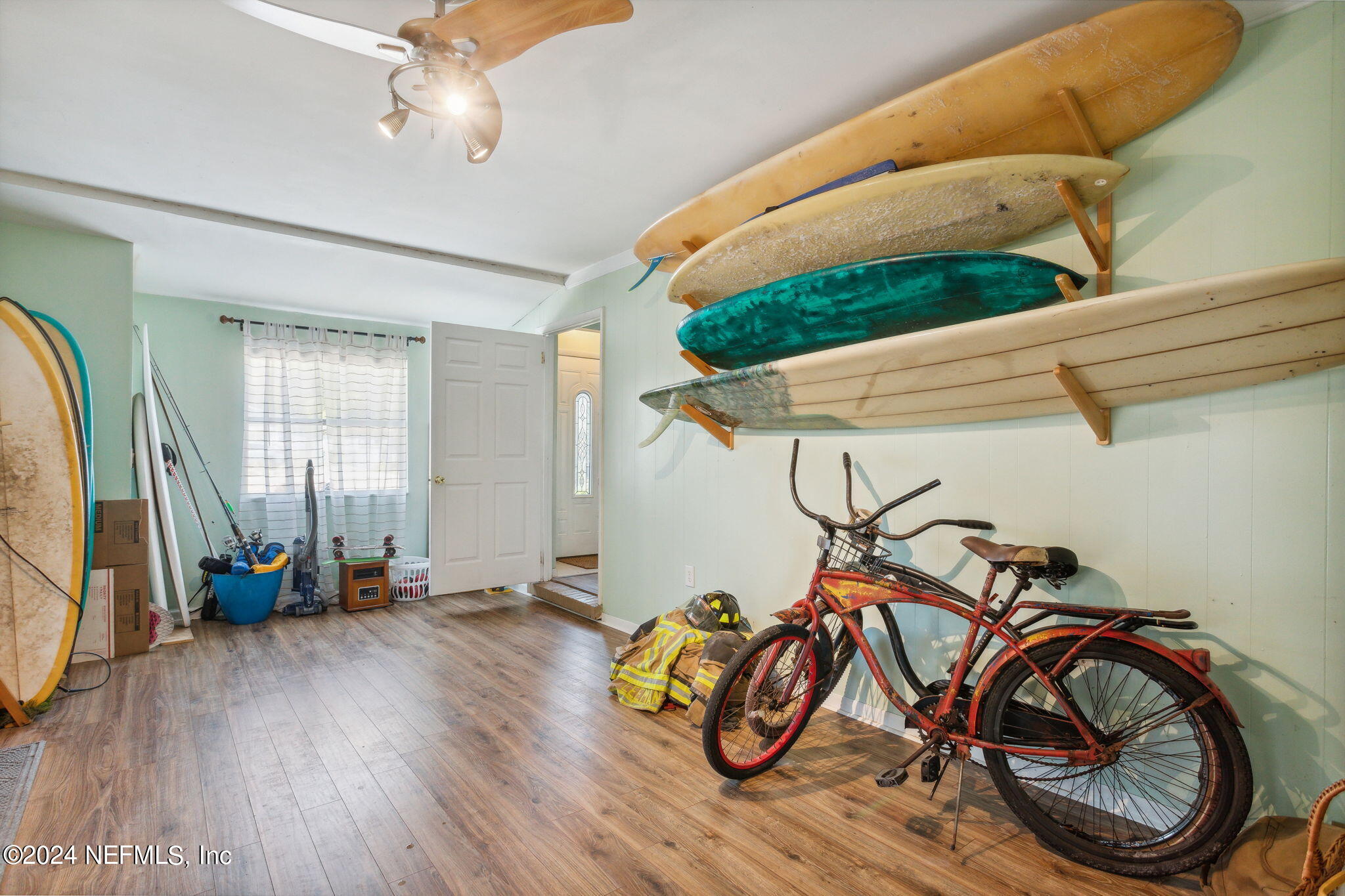 1154 Penman Road Jacksonville Beach, FL 32250 - Photo 8 of 20 a view of an room with gym equipment