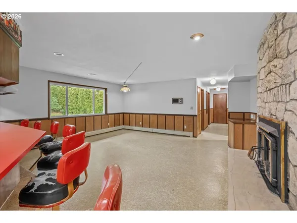a view of a hallway with windows
