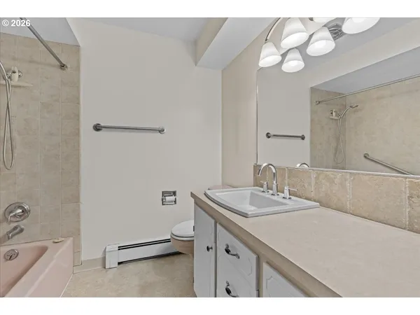 a bathroom with a sink double vanity and a mirror