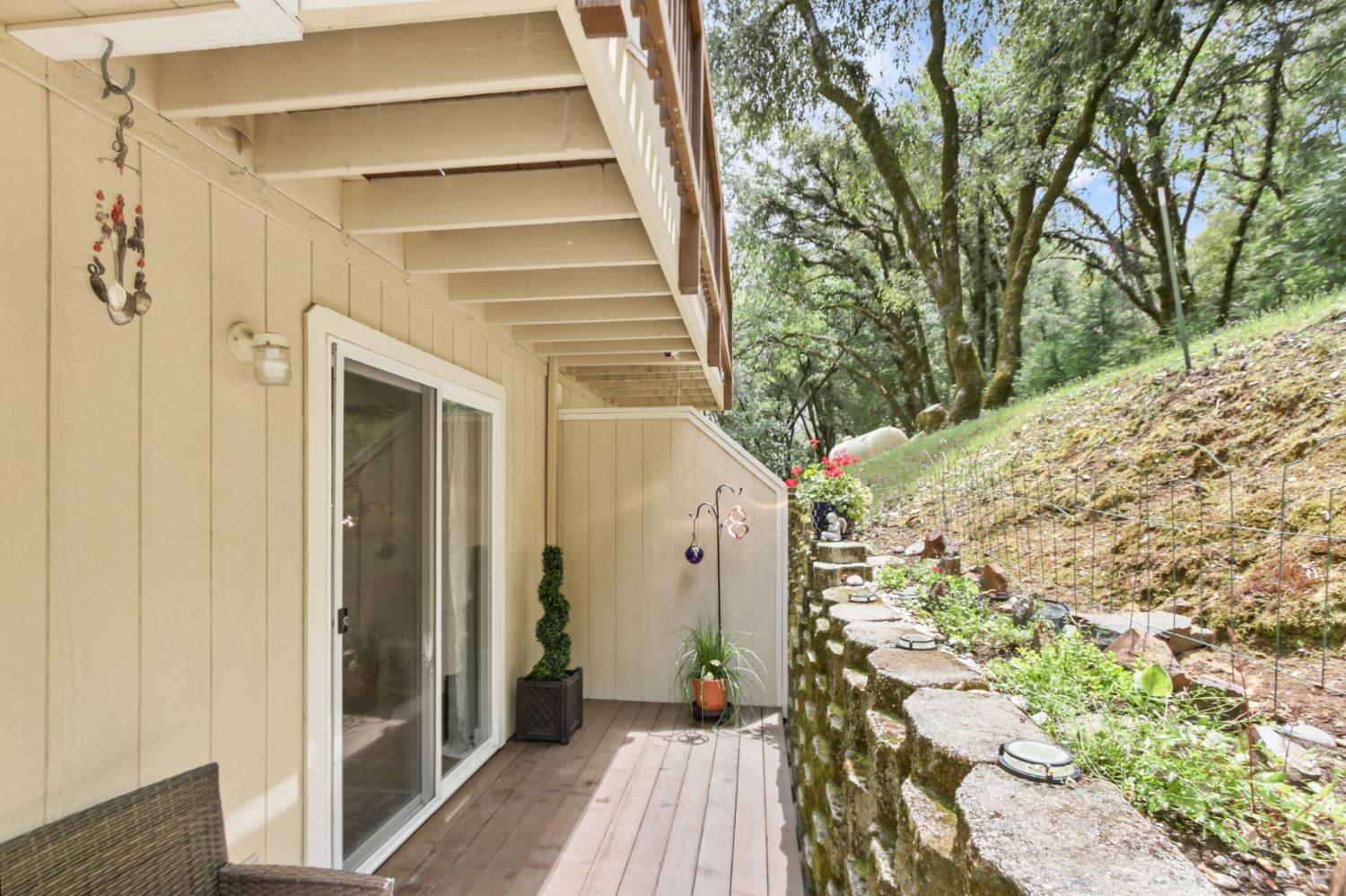 1336 Oak Ridge Drive Colfax, CA 95713 - Photo 32 of 39 Private patio off kitchen/dining room provides a peaceful retreat