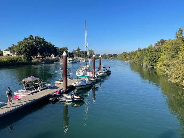 a lake view with a seating space