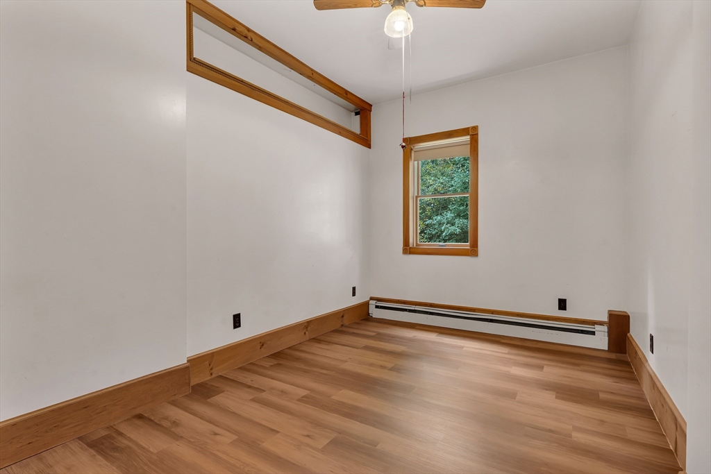 49 R Elm Street Blackstone, MA 01504 - Photo 13 of 42 a view of room with window and ceiling fan