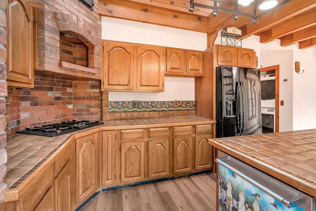 49 R Elm Street Blackstone, MA 01504 - Photo 20 of 42 a kitchen with stainless steel appliances granite countertop a sink and cabinets