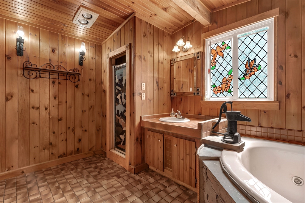 49 R Elm Street Blackstone, MA 01504 - Photo 28 of 42 a bathroom with a tub a sink and a shower