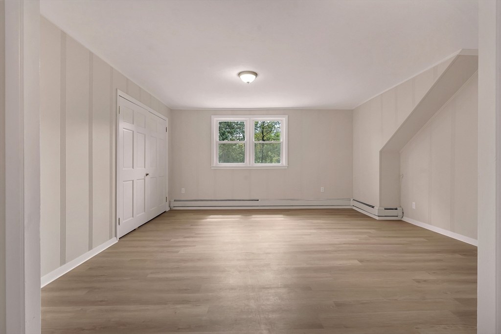 49 R Elm Street Blackstone, MA 01504 - Photo 33 of 42 wooden floor in an empty room with a window