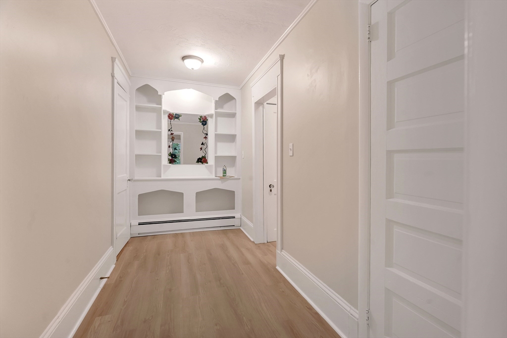 49 R Elm Street Blackstone, MA 01504 - Photo 39 of 42 a view of a hallway with wooden floor