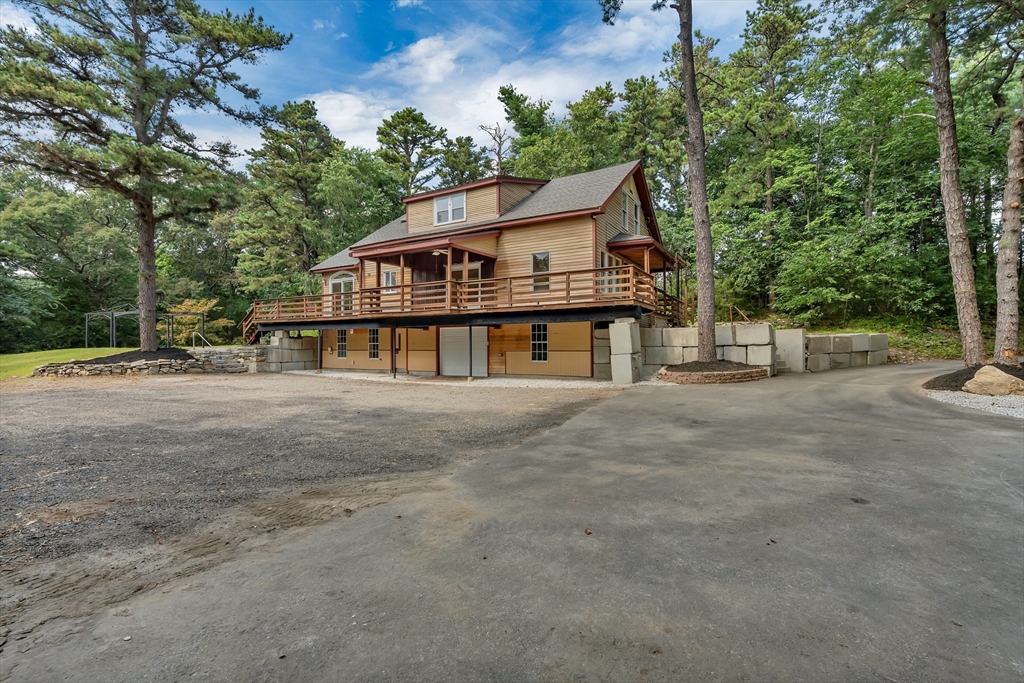 49 R Elm Street Blackstone, MA 01504 - Photo 5 of 42 a view of a house with a yard and large trees