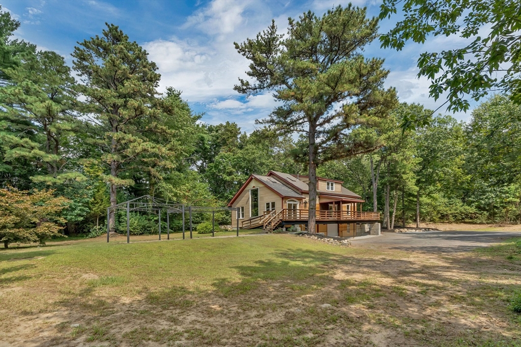 49 R Elm Street Blackstone, MA 01504 - Photo 6 of 42 a house view with a garden space
