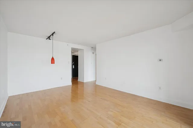 a view of a room with an empty space