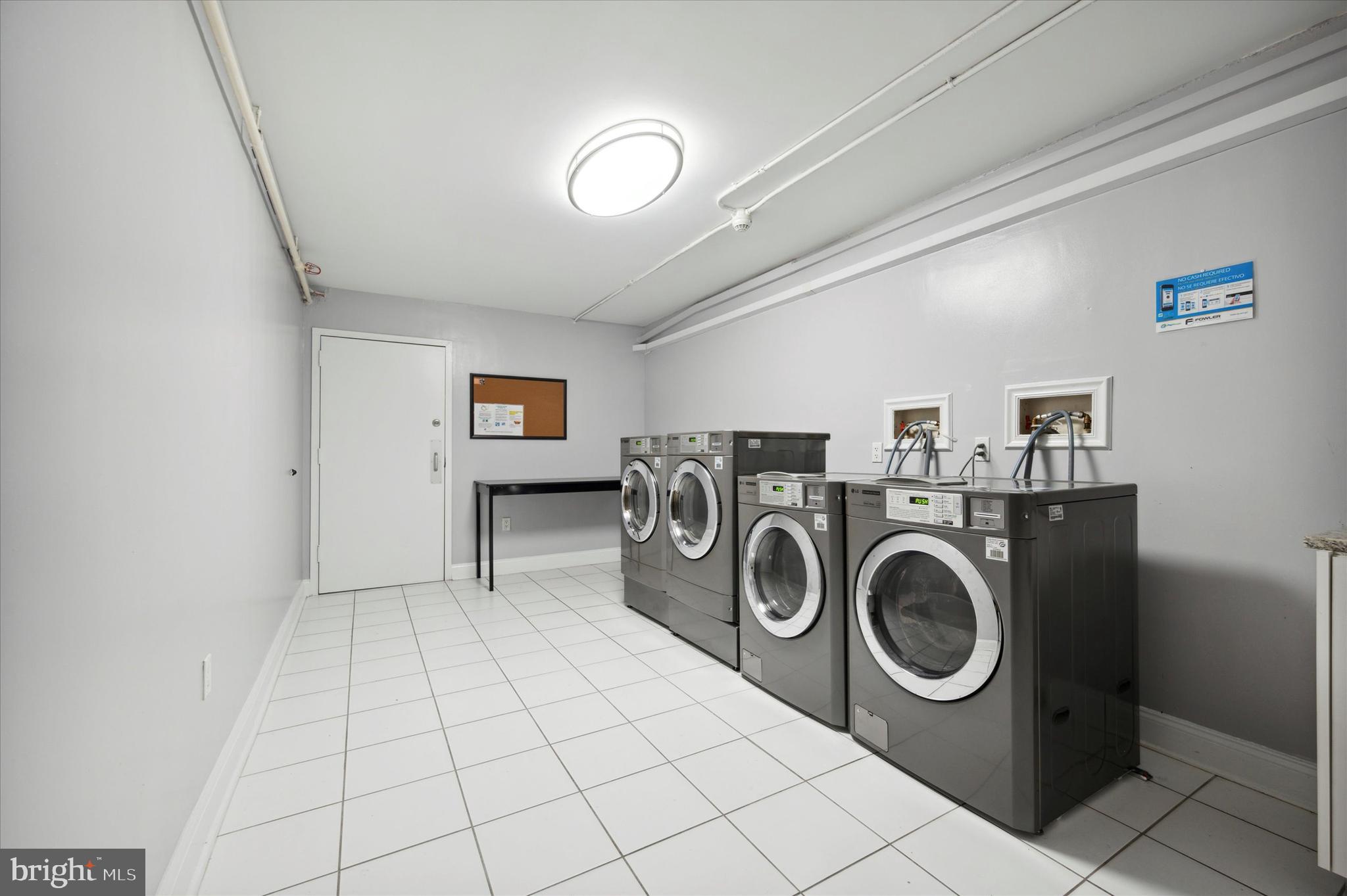 2001 Hamilton Street, Unit 1221 Philadelphia, PA 19130 - Photo 16 of 27 a utility room with dryer and washer