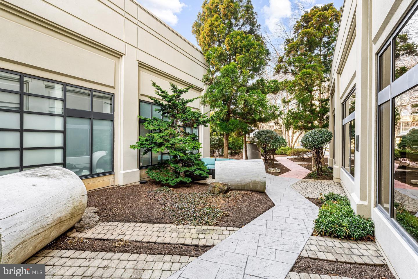 2001 Hamilton Street, Unit 1221 Philadelphia, PA 19130 - Photo 25 of 27 a view of a porch with furniture and a potted plant