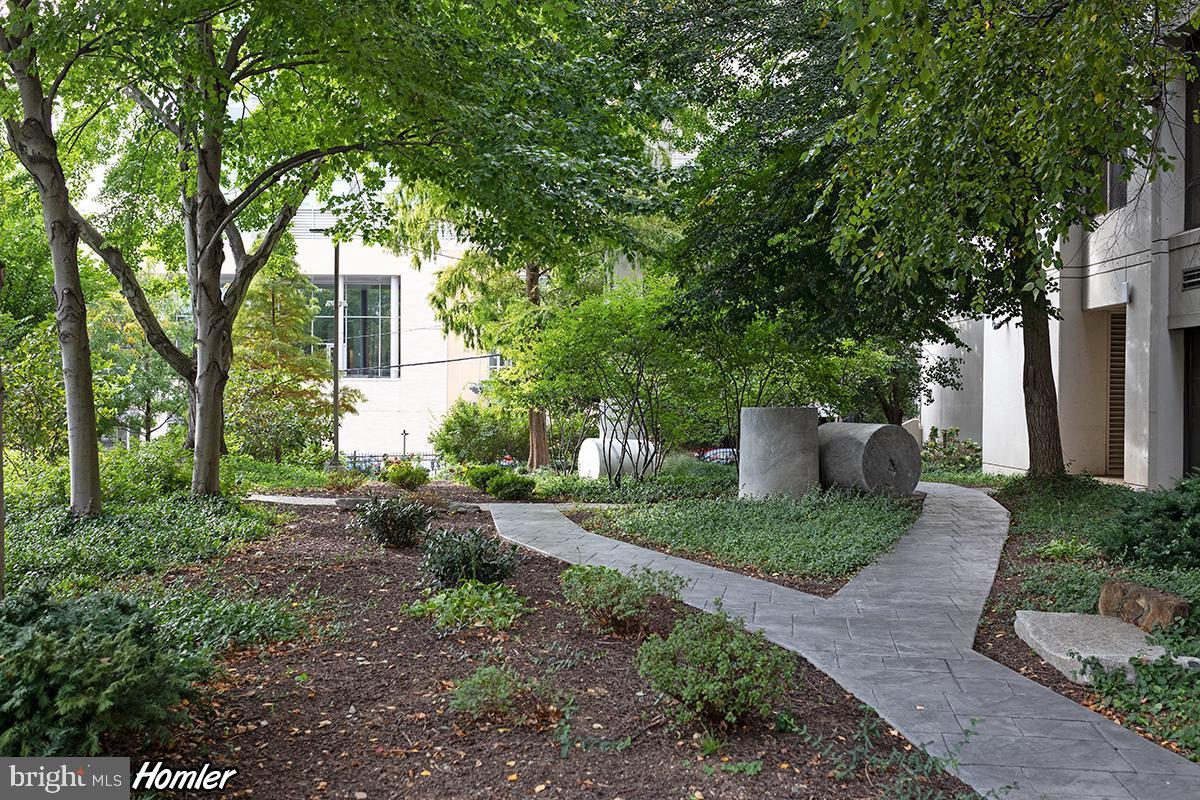 2001 Hamilton Street, Unit 1221 Philadelphia, PA 19130 - Photo 26 of 27 a front view of a house with garden