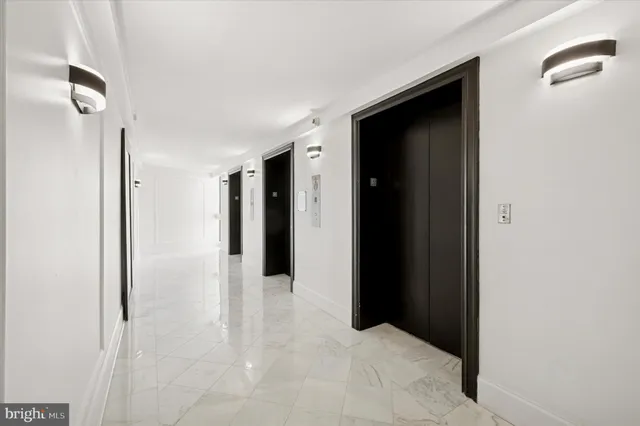 a view of a bathroom with a walk in closet