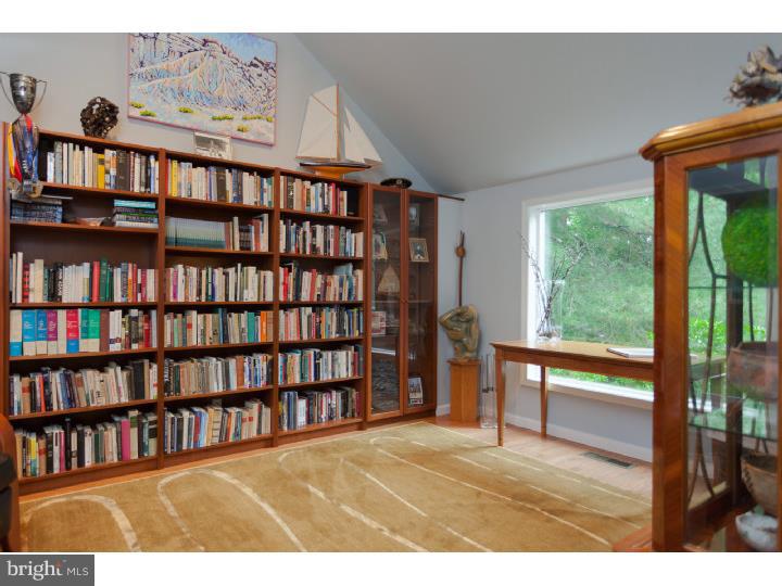 149 Fairview Road Penn Valley, PA 19072 - Photo 14 of 24 a view of a book shelf in a room