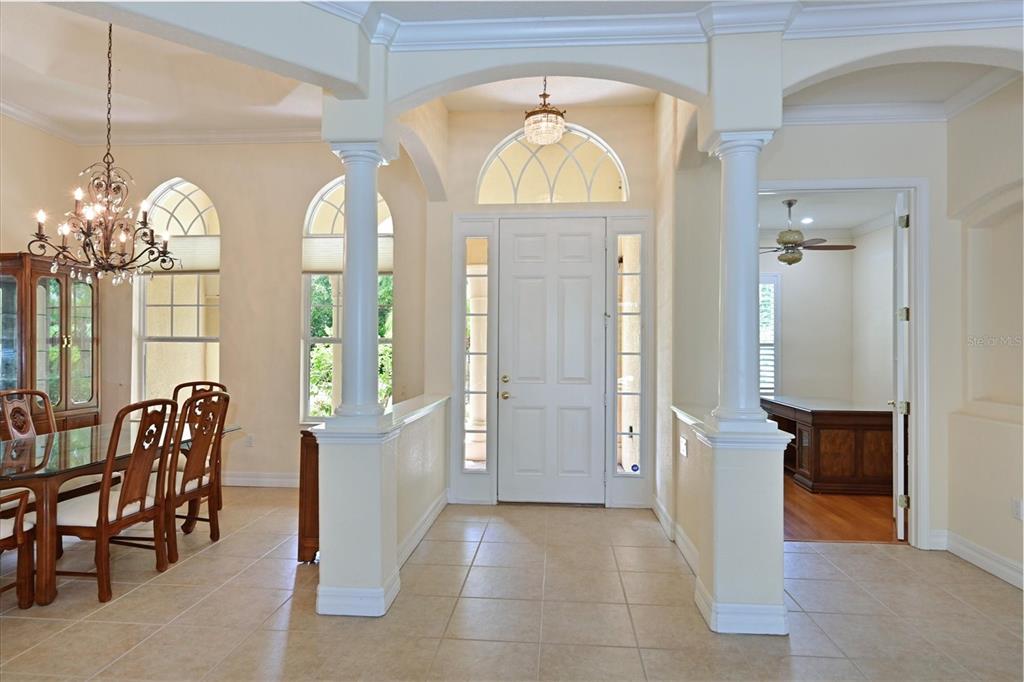 10622 Conch Shell Terrace Bradenton, FL 34212 - Photo 44 of 69 a view of a big room with windows and entryway