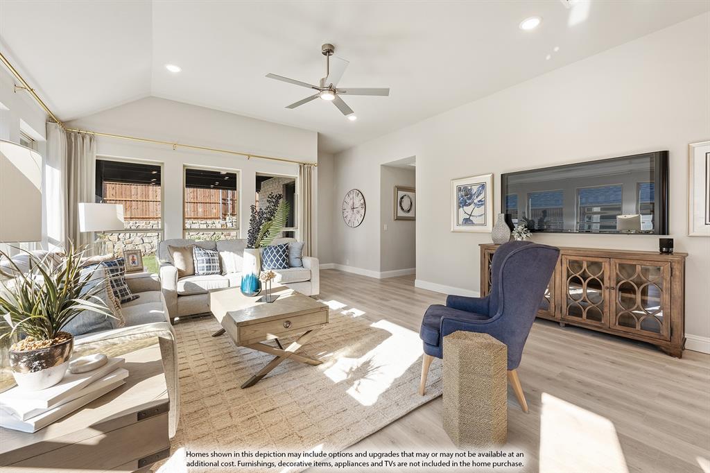 14550 Lovelace Street Pilot Point, TX 76258 - Photo 12 of 23 a living room with furniture dining area and a window